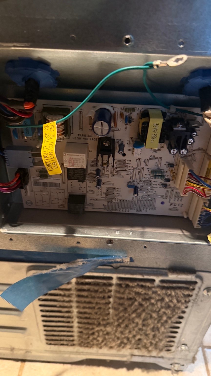 Installed GE refrigerator control board after power surge repair